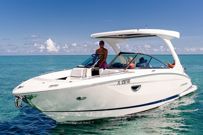 4 hour Private Boat charter to Stingray City, Snorkeling and More - Starfish Beach brings a slower final stop