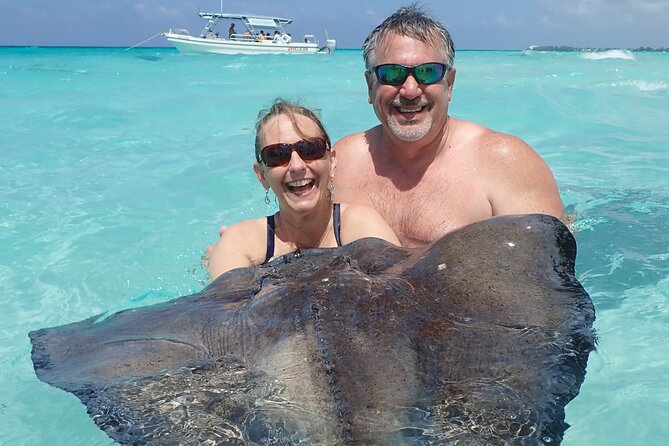 (Family owned) Stingray city sandbar, Starfish Beach & Snorkeling - Coral Gardens brings fish and a bit of snorkeling