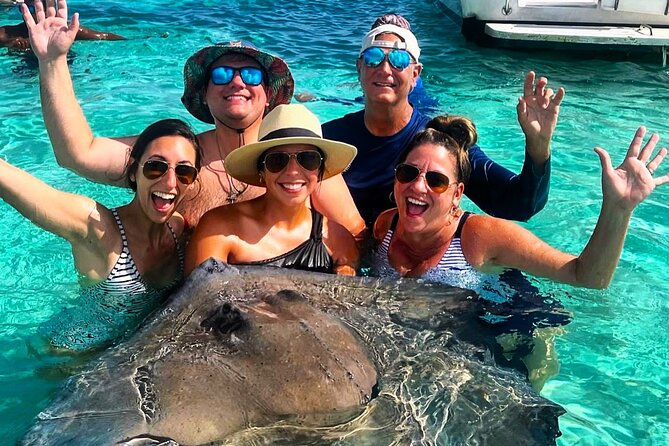 Private Charter 34ft Express Cruiser Stingay City Reef Snorkeling - Snorkeling the reefs around Grand Cayman