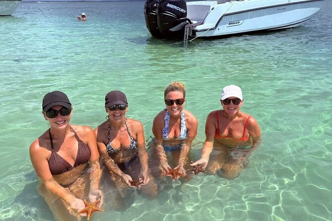 Private Charter for Stingray city - Searching the seagrass for starfish
