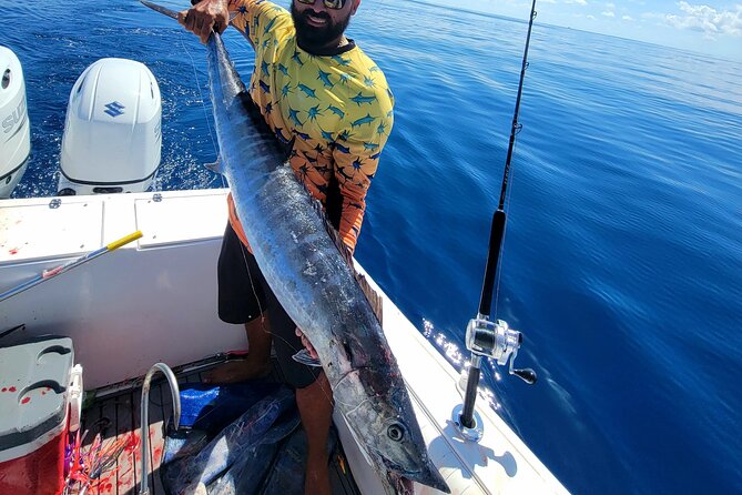Private Deep Sea Fishing Experience in Grand Cayman - Booking, timing, and cancellation advice